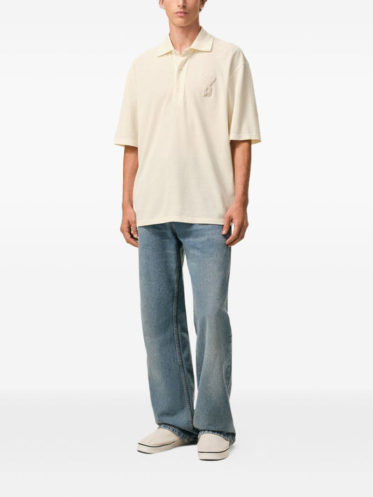 Polo Ami de Coeur con applicazione